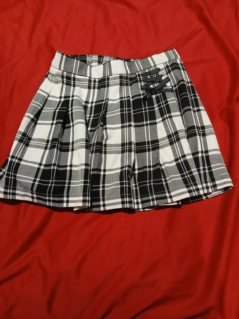 Justice Black and White Plaid Pleated Skirt with Side Ribbon Detail
